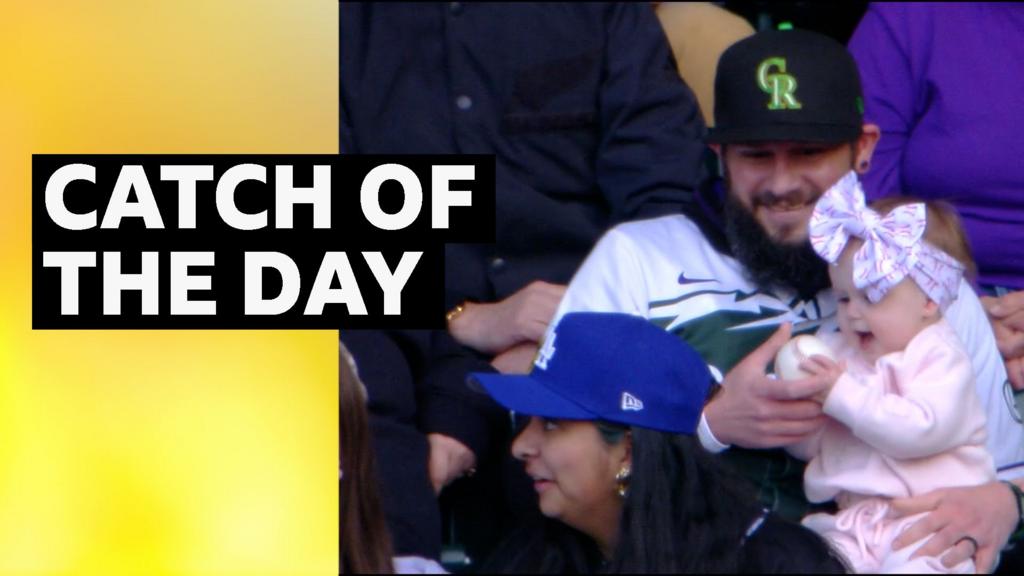 MLB: Colorado Rockies fan catches ball while holding baby